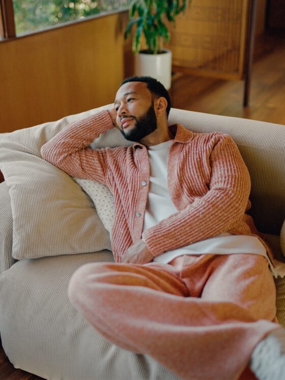 John Legend showcasing The Journeys Collection by Rove Concepts, featuring luxury home furnishings inspired by his personal style and design philosophy